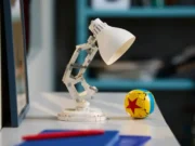 LEGO and Pixar reveal Luxo Jr due on June 1, 2025 LEGO Disney Pixar Luxo Jr 21357 real-life shot by The LEGO Group of this upcoming set on a table with the LEGO Pixar ball