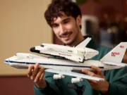 LEGO Shuttle Carrier Aircraft (10360) Officially Takes Off on May 18 LEGO Ideas Shuttle Carrier Aircraft (10360) set held by a person who is displaying its full size